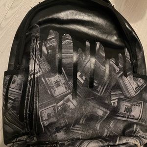 Sprayground money drip backpack